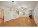Bright living room featuring hardwood floors and wood burning stove at 3603 Cr 626N, Bushnell, FL 33513