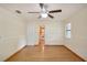 Living room with hardwood floors and view of kitchen at 3603 Cr 626N, Bushnell, FL 33513