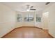 Bright living room featuring hardwood floors and bay window at 3603 Cr 626N, Bushnell, FL 33513