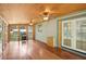Sunroom with wood floors and ceiling fans at 3603 Cr 626N, Bushnell, FL 33513