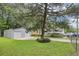 Large backyard with spacious metal garage and RV parking at 3603 Cr 626N, Bushnell, FL 33513