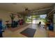 Garage with open door, showing backyard view at 6023 Country Walk Ln, Winter Haven, FL 33880