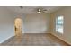 Living room with tile floors and view of bathroom at 2217 Betsy Ross Ln # A, St Cloud, FL 34769