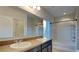 Bathroom with double vanity, tub and shower at 2217 Betsy Ross Ln # A, Saint Cloud, FL 34769