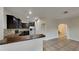 Modern kitchen with dark cabinets and granite countertops at 2217 Betsy Ross Ln # A, St Cloud, FL 34769