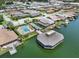 Community pool, tennis courts, and clubhouse at 696 Caribbean Dr, Lakeland, FL 33803
