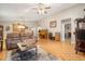 Bright living room with hardwood floors, comfortable seating, and a cozy atmosphere at 696 Caribbean Dr, Lakeland, FL 33803