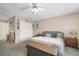 Bedroom with carpeted floors, a king-size bed, and ample closet space at 696 Caribbean Dr, Lakeland, FL 33803