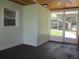 Bright screened porch with view of backyard at 10742 W Beach Pkwy, Lake Wales, FL 33898