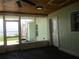 Relaxing screened porch overlooking the lake at 10742 W Beach Pkwy, Lake Wales, FL 33898