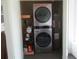 Stacked washer and dryer in a dedicated laundry room at 10742 W Beach Pkwy, Lake Wales, FL 33898