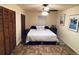 King-size bed in spacious bedroom with double door closet at 535 Minnow Ct, Kenansville, FL 34739