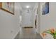 Bright and airy entryway with tile flooring and access to living areas at 1801 Stargazer Trl, Kissimmee, FL 34758