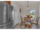 Cozy kitchen nook with table and chairs, plus a window view at 1801 Stargazer Trl, Kissimmee, FL 34758
