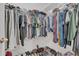 Walk-in closet with ample shelving and hanging space at 1801 Stargazer Trl, Kissimmee, FL 34758