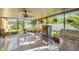Large screened patio with grill and outdoor furniture at 1801 Stargazer Trl, Kissimmee, FL 34758
