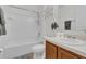 Simple bathroom with a shower/tub combo and vanity at 1801 Stargazer Trl, Kissimmee, FL 34758
