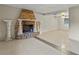 Spacious living room featuring a brick fireplace and tile floors at 2800 S Park Ave, Sanford, FL 32773