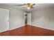 Bedroom with hardwood floors and access to bathroom at 2800 S Park Ave, Sanford, FL 32773