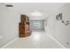 Spacious living area with tile floors and brick fireplace at 2800 S Park Ave, Sanford, FL 32773