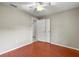 Bedroom with hardwood floors and access to bathroom at 2800 S Park Ave, Sanford, FL 32773