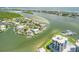 Wide view of waterfront properties and a community at 444 Quay Assisi, New Smyrna Beach, FL 32169