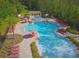 Resort-style pool with spa and plenty of lounge chairs at 8157 Roseville Blvd, Davenport, FL 33896