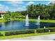 Serene pond with three water fountains at 8157 Roseville Blvd, Davenport, FL 33896
