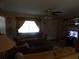 Living room with two sofas and ceiling fan at 1060 E Tee Cir, Bartow, FL 33830