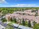 An aerial view of the community showing building rooftops and parking at 4897 Cypress Woods Dr # 6107, Orlando, FL 32811