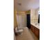 Bathroom with tub, shower, toilet, and vanity at 4000 Santa Maria Dr # 108, Kissimmee, FL 34741