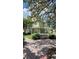 Two-story light green house with white fence at 4000 Santa Maria Dr # 108, Kissimmee, FL 34741