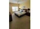 Spacious bedroom with large window and ceiling fan at 4000 Santa Maria Dr # 108, Kissimmee, FL 34741
