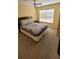 Bedroom with queen bed and ceiling fan at 4000 Santa Maria Dr # 108, Kissimmee, FL 34741