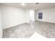 Spacious dining area with light grey tile flooring at 752 Reggie Rd, Winter Haven, FL 33884