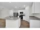 Modern kitchen with white cabinets and granite countertops at 3422 Sw 165Th Loop, Ocala, FL 34473
