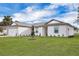 Single-story home with a two-car garage and landscaping at 3422 Sw 165Th Loop, Ocala, FL 34473
