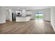 Open concept kitchen with island and stainless steel appliances at 3422 Sw 165Th Loop, Ocala, FL 34473