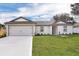 Newly constructed one-story house with a garage and yard at 3422 Sw 165Th Loop, Ocala, FL 34473