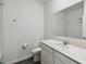 Clean bathroom with vanity, toilet, and shower at 1122 James Paul Rd, Davenport, FL 33837