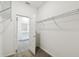 Walk-in closet with access to bathroom at 1122 James Paul Rd, Davenport, FL 33837