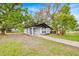 Charming bungalow home with gray exterior and landscaped front yard at 2541 Idlewild St, Lakeland, FL 33801