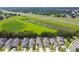 Aerial view of houses and community with a highway nearby at 6294 Manitoba Dr, Lakeland, FL 33805