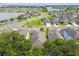 Aerial view of houses near a lake at 6294 Manitoba Dr, Lakeland, FL 33805