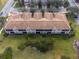 Aerial view showcasing the building's exterior and landscaping at 8311 Foster Dr, Davenport, FL 33896