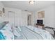 Spacious bedroom with a king-size bed and built-in wardrobe at 8311 Foster Dr, Davenport, FL 33896