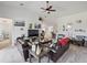 Open concept living room with multiple seating areas at 8311 Foster Dr, Davenport, FL 33896