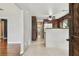 View of kitchen and hallway from entryway at 215 Young Pl, Lakeland, FL 33803