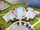 Resort-style pool with expansive sundeck and multiple seating areas at 14234 Lanikai Beach Dr, Orlando, FL 32827
