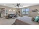 Spacious bedroom with sitting area and built-in shelving at 14234 Lanikai Beach Dr, Orlando, FL 32827